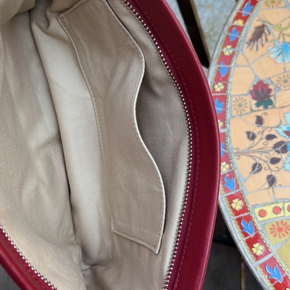 Coach burgundy clutch - hardly used. Like new. Rare color. - Picture 5 of 8